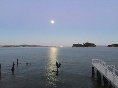 Full moon over bay